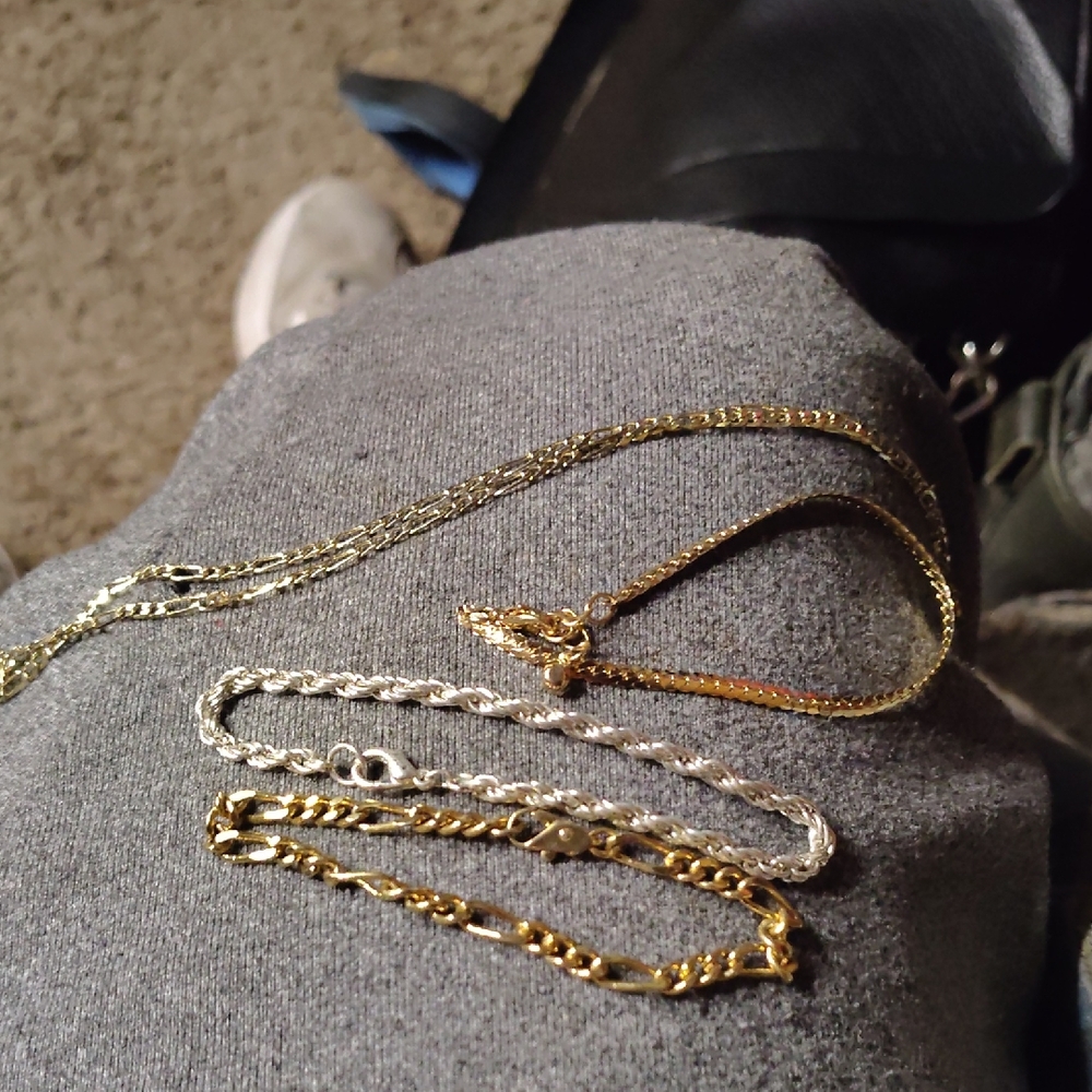 I have 3 Bracelets And One Necklace Plus 2 Rings Costume Jewelry